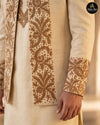 Close view of bronze floral embroidery on ivory prince coat - Abito Men